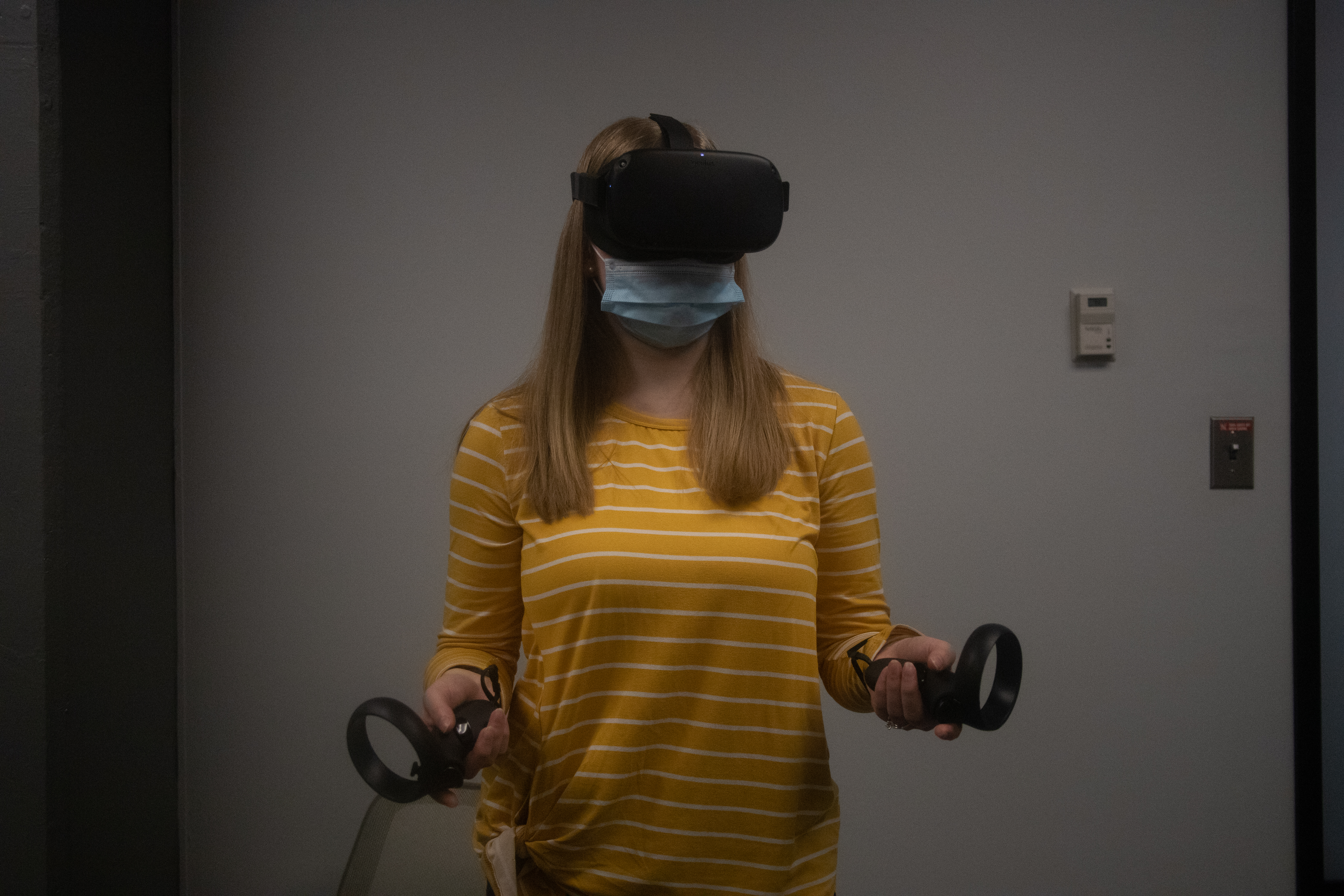 Photo Credit: Photo of student with VR headset