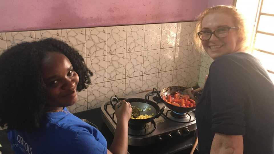 Two students preparing food