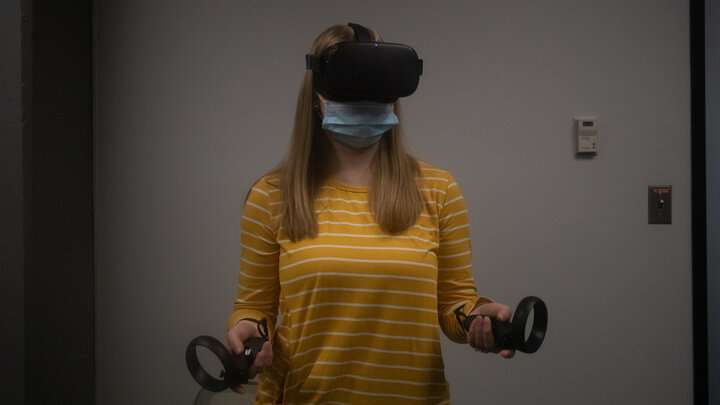 Photo of student with VR headset